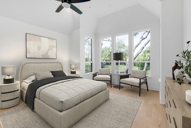 394 Leaning Rock Rdg, Austin, TX 78737 - bedroom featuring light wood-style floors, a ceiling fan, baseboards, and high vaulted ceiling