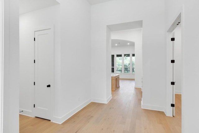 394 Leaning Rock Rdg, Austin, TX 78737 - hallway featuring light wood finished floors and baseboards