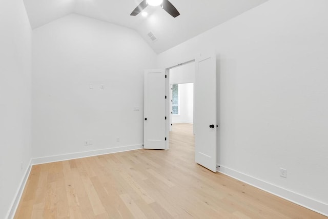 394 Leaning Rock Rdg, Austin, TX 78737 - spare room featuring vaulted ceiling, ceiling fan, light wood-style floors, and baseboards