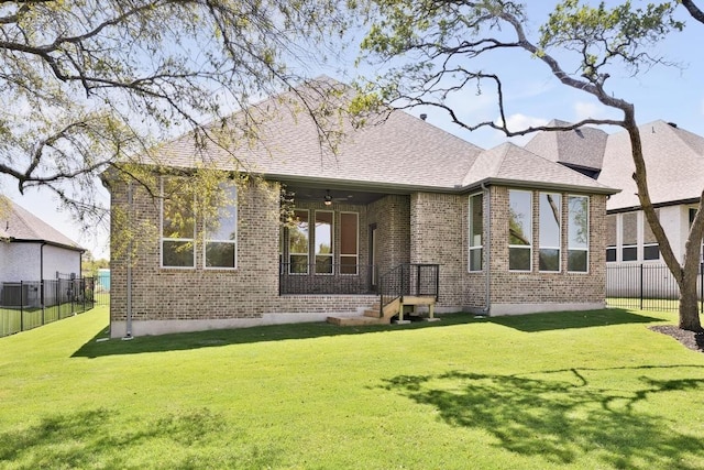 394 Leaning Rock Rdg, Austin, TX 78737 - back of property featuring brick siding and roof with shingles