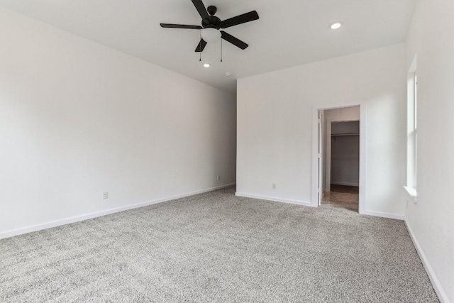 carpeted spare room with baseboards, recessed lighting, and ceiling fan