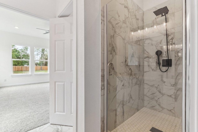 full bath featuring a marble finish shower and marble finish floor