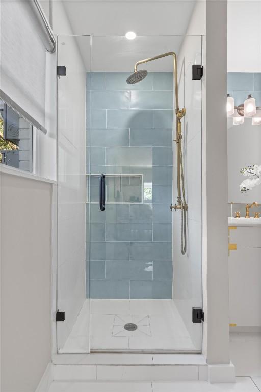 3400 Santa Fe Dr, Austin, TX 78741 - bathroom featuring a shower stall and vanity