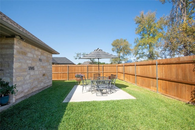 view of yard featuring a fenced backyard and a patio