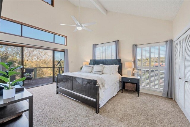 8509 Appalachian Dr, Austin, TX 78759 - bedroom featuring access to outside, high vaulted ceiling, carpet floors, beamed ceiling, and a ceiling fan