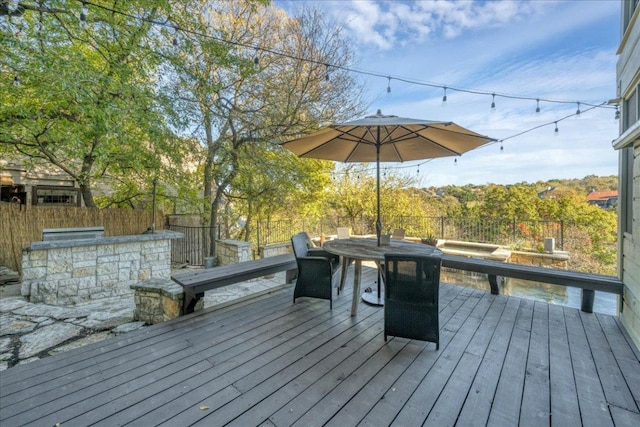 deck featuring a fenced backyard