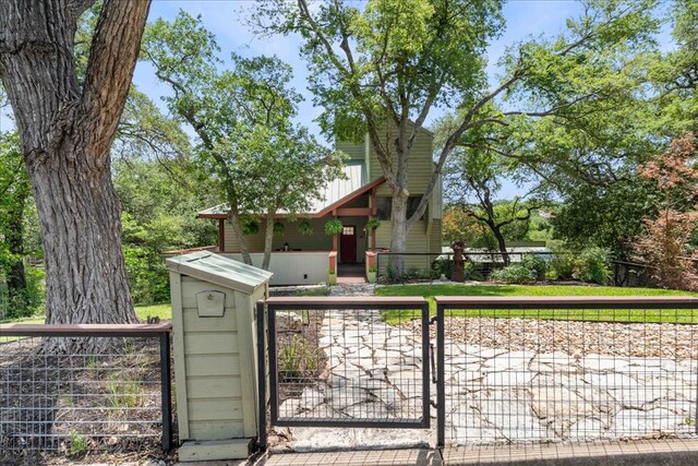 8509 Appalachian Dr, Austin, TX 78759 - obstructed view of property with a gate and a fenced front yard