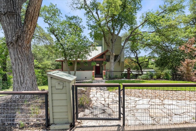 8509 Appalachian Dr, Austin, TX 78759 - view of front of house featuring a gate and a fenced front yard