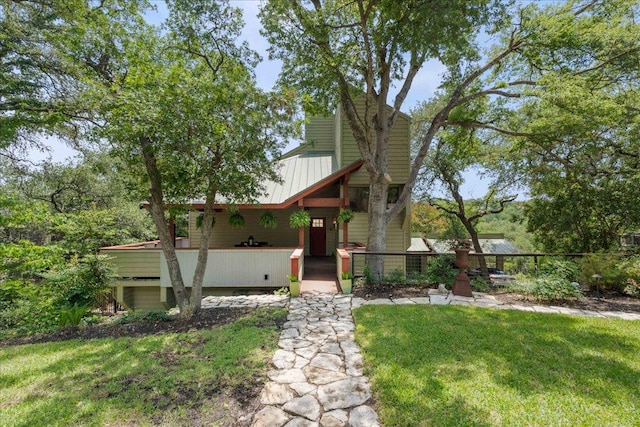 8509 Appalachian Dr, Austin, TX 78759 - view of front of property with a front lawn and a metal roof