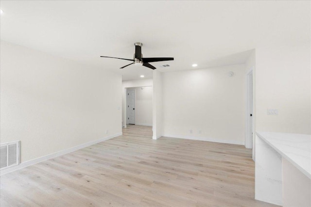 6007 Wideleaf Dr, Austin, TX 78724 - spare room with visible vents, a ceiling fan, light wood-style floors, and recessed lighting