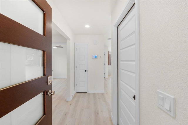 6007 Wideleaf Dr, Austin, TX 78724 - hall featuring baseboards and light wood-type flooring