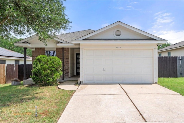 6007 Wideleaf Dr, Austin, TX 78724 - ranch-style house with brick siding, driveway, a front yard, and fence