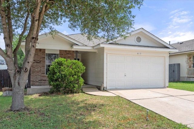 6007 Wideleaf Dr, Austin, TX 78724 - single story home with driveway, a front lawn, brick siding, and a garage