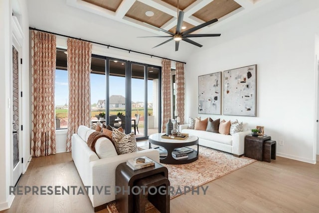 1708 Snowdrop Dr, Georgetown, TX 78628 - living room with coffered ceiling, wood finished floors, a ceiling fan, beamed ceiling, and baseboards