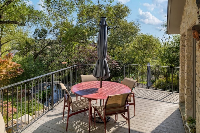 balcony featuring outdoor dining space