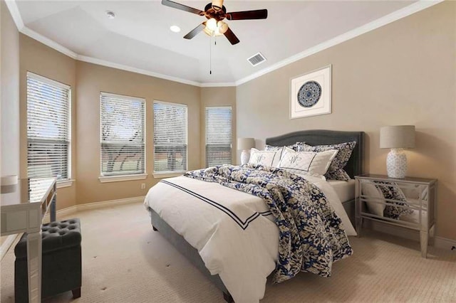 bedroom with carpet flooring, baseboards, visible vents, and multiple windows