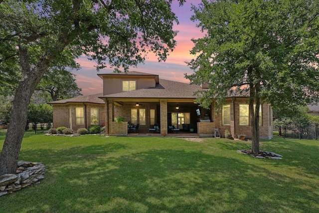 190 Estrella Xing, Georgetown, TX 78628 - back of property with brick siding and a patio area