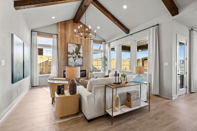2108 Tobiano Trce, Georgetown, TX 78633 - living area featuring wood finished floors, a chandelier, baseboards, and recessed lighting