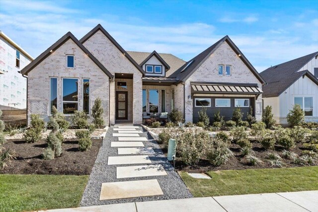 2108 Tobiano Trce, Georgetown, TX 78633 - view of front of home with brick siding