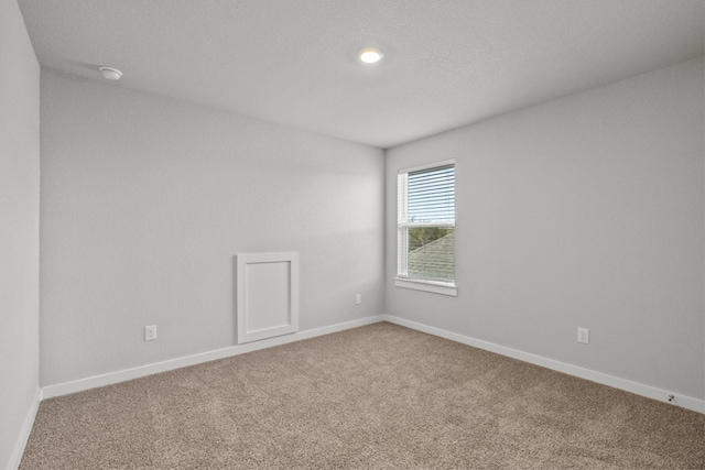 2705 Sage Ranch Dr Unit 30, Leander, TX 78641 - carpeted empty room featuring baseboards