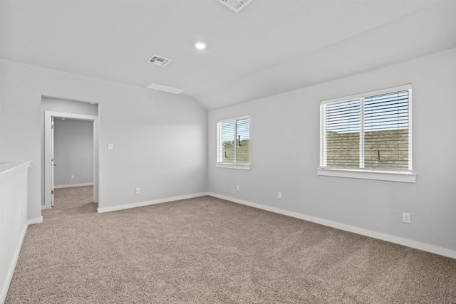 2705 Sage Ranch Dr Unit 30, Leander, TX 78641 - empty room with carpet flooring, baseboards, lofted ceiling, and recessed lighting