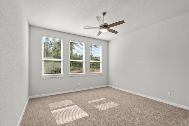 2705 Sage Ranch Dr Unit 30, Leander, TX 78641 - unfurnished room with ceiling fan, carpet flooring, and baseboards