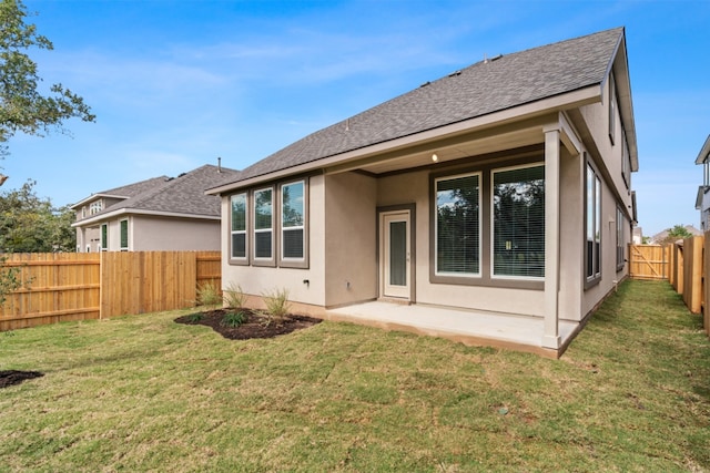 2705 Sage Ranch Dr Unit 30, Leander, TX 78641 - back of property with roof with shingles, a patio, and stucco siding