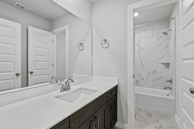 2705 Sage Ranch Dr Unit 30, Leander, TX 78641 - full bathroom with marble finish flooring, vanity, baseboards, and tub / shower combination