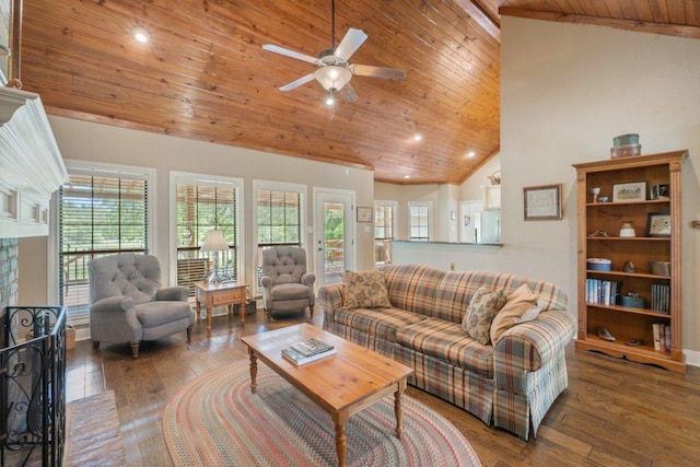 living area with hardwood / wood-style floors, wooden ceiling, and ceiling fan