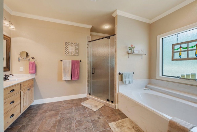 bathroom with a bath, vanity, crown molding, and a stall shower