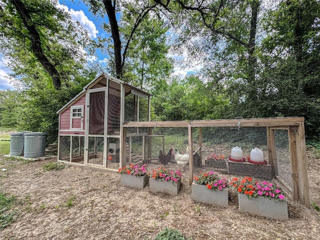view of poultry coop featuring central AC