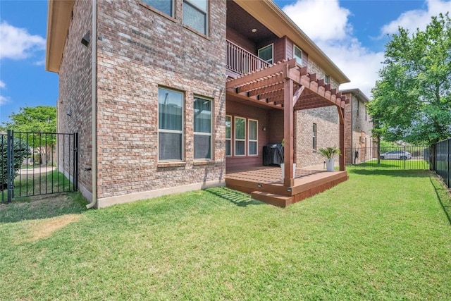 back of property with a fenced backyard, a wooden deck, brick siding, a lawn, and a balcony