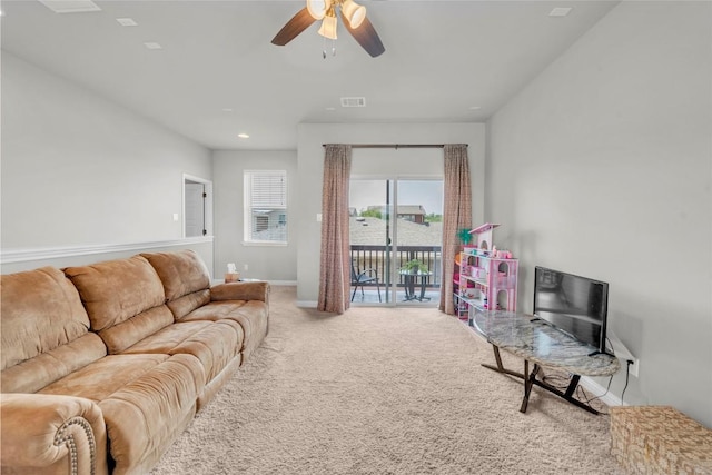 living area with carpet flooring, visible vents, baseboards, recessed lighting, and ceiling fan