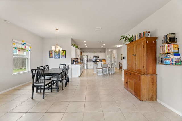dining area featuring baseboards, an inviting chandelier, recessed lighting, and light tile patterned flooring