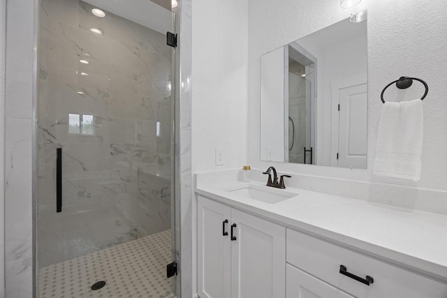 17701 Village Dr, Dripping Springs, TX 78620 - full bath featuring a marble finish shower and vanity