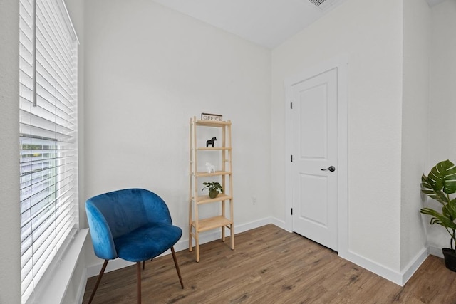 17701 Village Dr, Dripping Springs, TX 78620 - sitting room with wood finished floors and baseboards