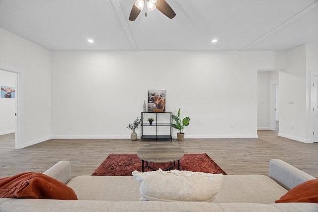 17701 Village Dr, Dripping Springs, TX 78620 - living room with wood finished floors, ceiling fan, baseboards, and recessed lighting