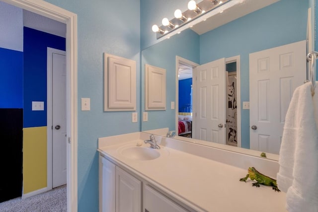 ensuite bathroom with vanity and ensuite bathroom