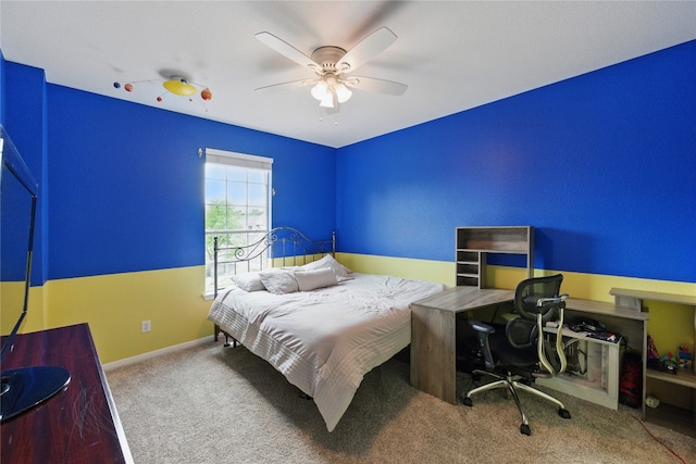 bedroom with carpet floors, baseboards, and ceiling fan