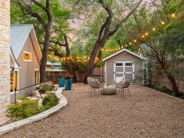 2608 S 2nd St, Austin, TX 78704 - yard at dusk featuring a fenced backyard