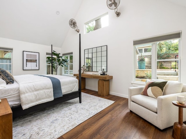 2608 S 2nd St, Austin, TX 78704 - bedroom featuring high vaulted ceiling, wood finished floors, and baseboards