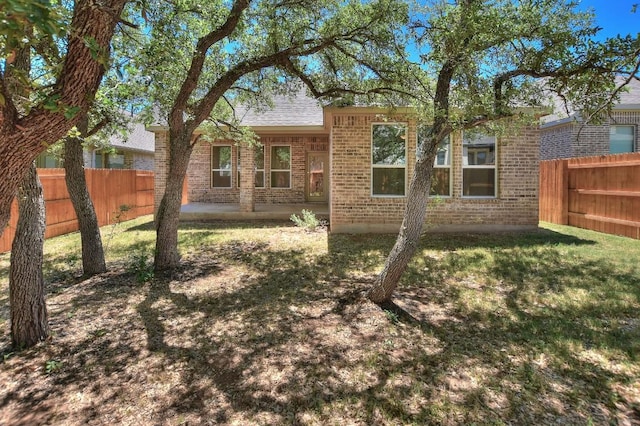 141 Green Knoll Ln, Georgetown, TX 78628 - back of house with brick siding