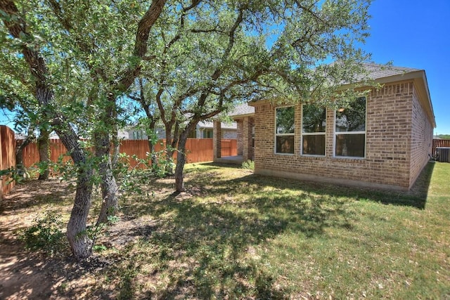 141 Green Knoll Ln, Georgetown, TX 78628 - view of yard with central air condition unit