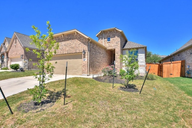 141 Green Knoll Ln, Georgetown, TX 78628 - view of front of home with an attached garage, brick siding, and driveway