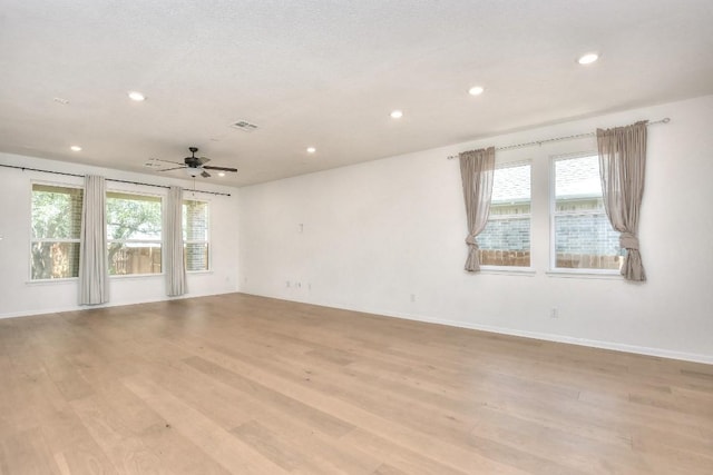 141 Green Knoll Ln, Georgetown, TX 78628 - unfurnished room with recessed lighting, light wood finished floors, ceiling fan, and baseboards