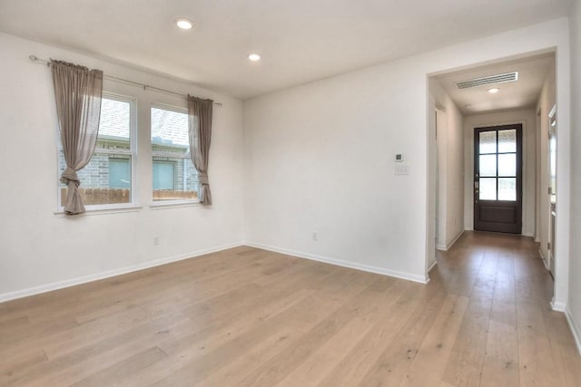 141 Green Knoll Ln, Georgetown, TX 78628 - foyer entrance with plenty of natural light, light wood-style floors, baseboards, and recessed lighting