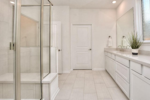 141 Green Knoll Ln, Georgetown, TX 78628 - full bathroom with vanity, a shower stall, baseboards, recessed lighting, and tile patterned floors