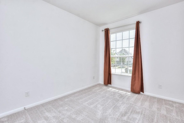 141 Green Knoll Ln, Georgetown, TX 78628 - spare room with light colored carpet and baseboards