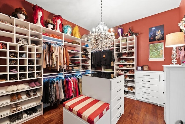 6209 Ledge Mountain Dr, Austin, TX 78731 - walk in closet featuring a chandelier and dark wood-style floors