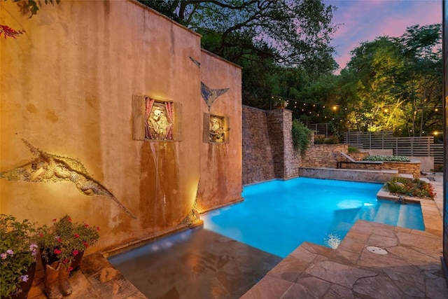 6209 Ledge Mountain Dr, Austin, TX 78731 - pool at dusk featuring a patio